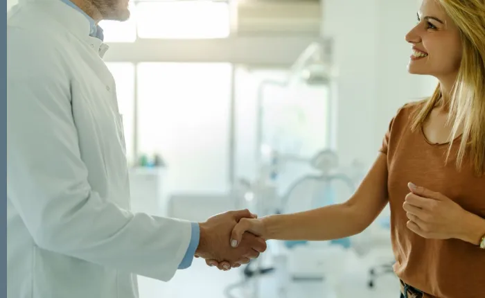 Patient thanking our chiropractor in tarpon springs